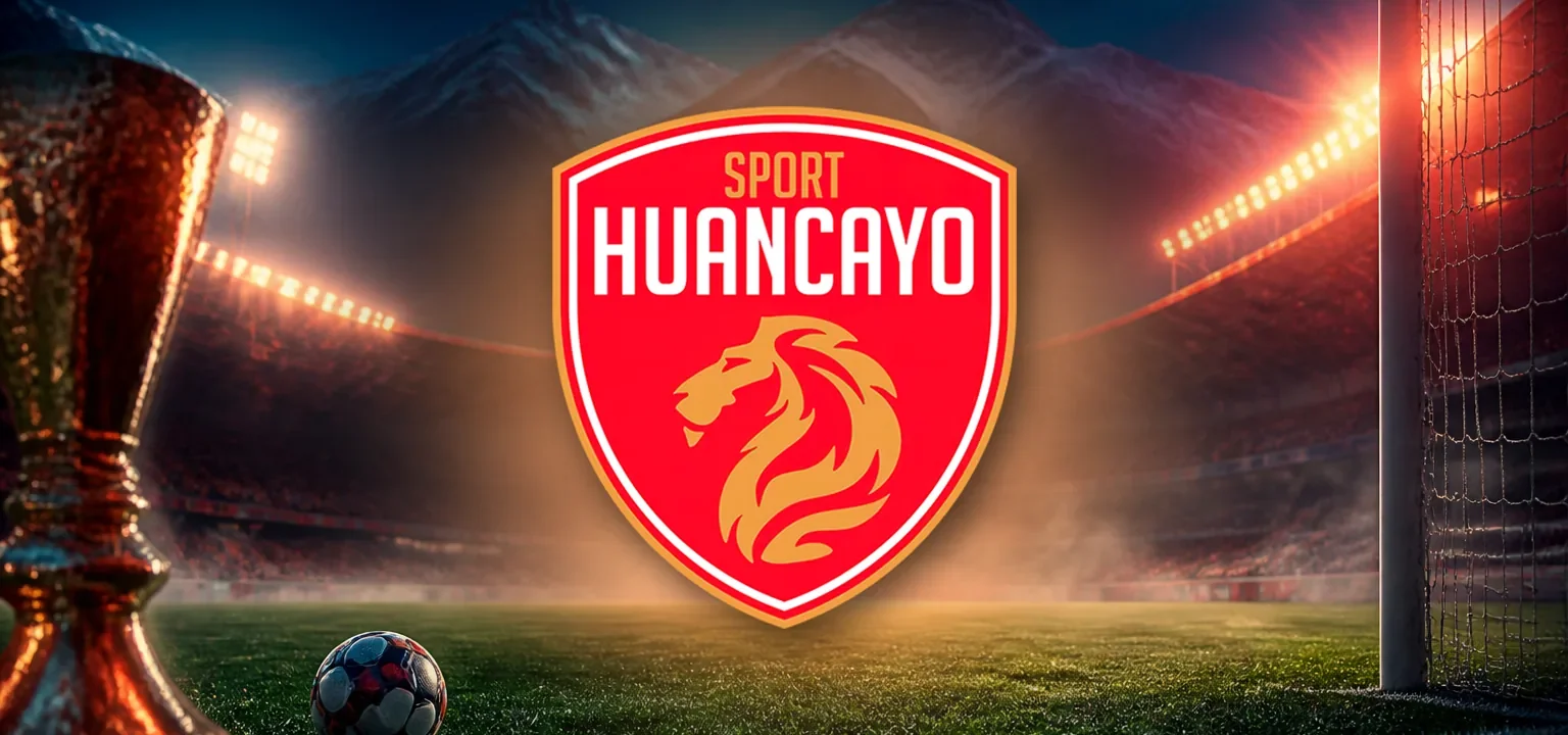 Escudo del Sport Huancayo sobre un estadio de los Andes de noche